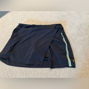 Lucy Black Athletic Skort with Green Stripe